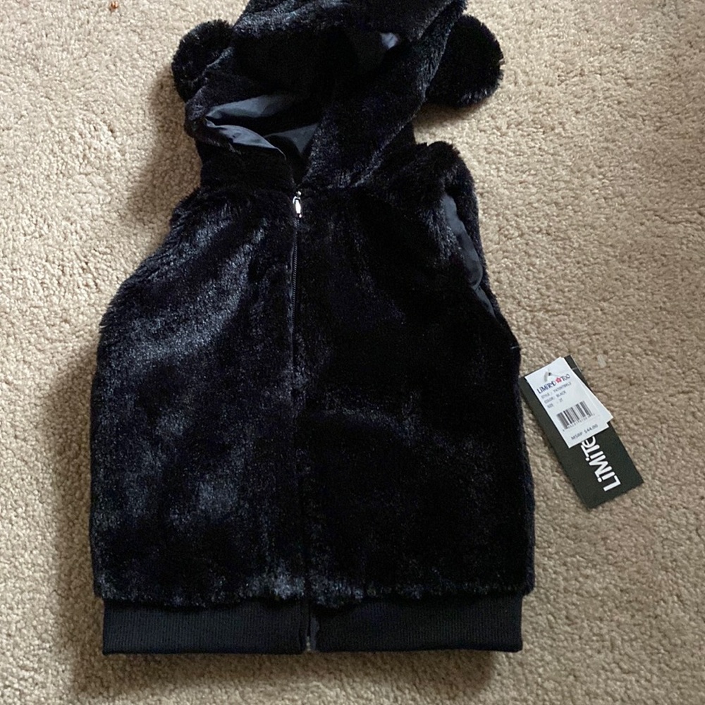 Vest with tags